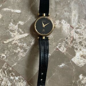 Gucci Gold and Black Leather Watch
